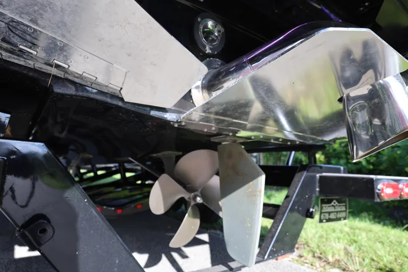 Slide: The Image of 2024 Supra SE550 boat propeller and hull detail, showcasing sleek design and engineering. - 7