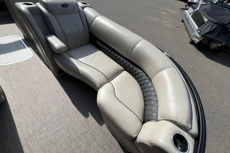 Slide: The Image of Luxurious seating on 2020 Barletta L23U pontoon boat with elegant upholstery and cup holders. - 8