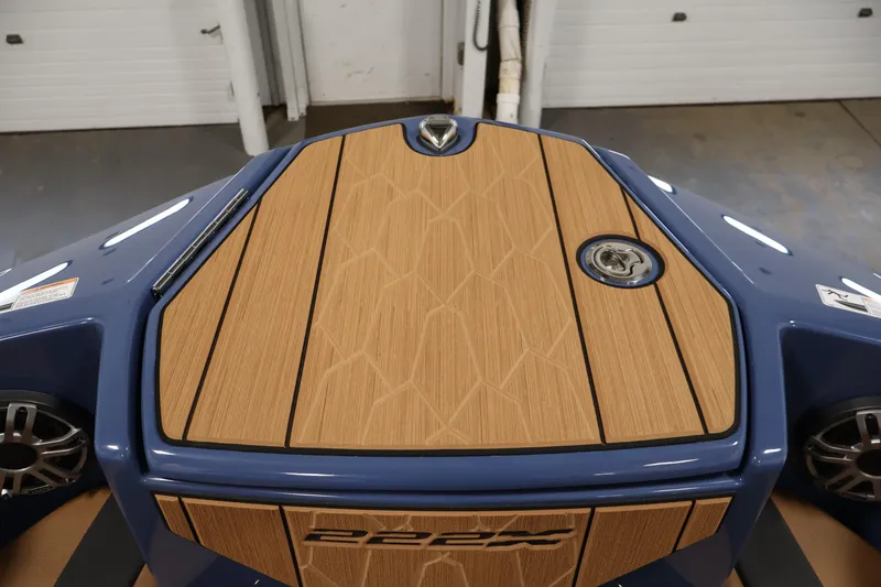 Slide: The Image of 2026 Yamaha Boats 222XD bow with sleek wood finish and modern design. - 11