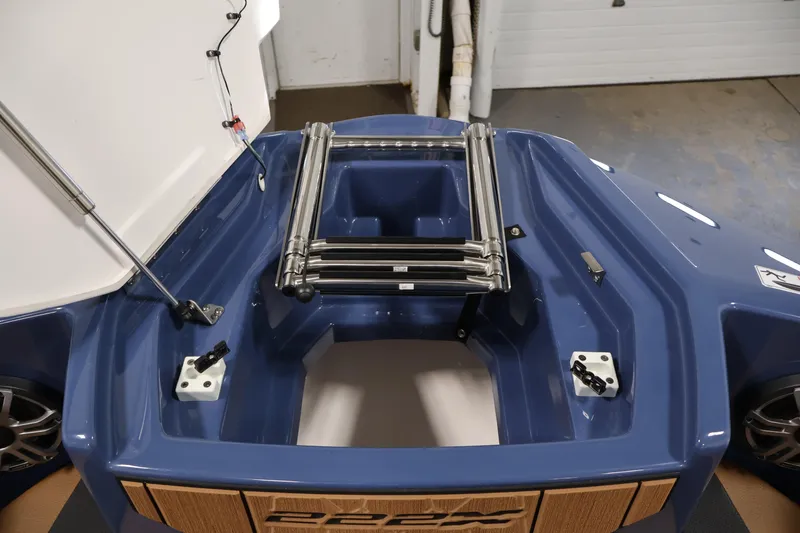 Slide: The Image of 2026 Yamaha Boats 222XD swim platform with stainless steel ladder and blue finish. - 12