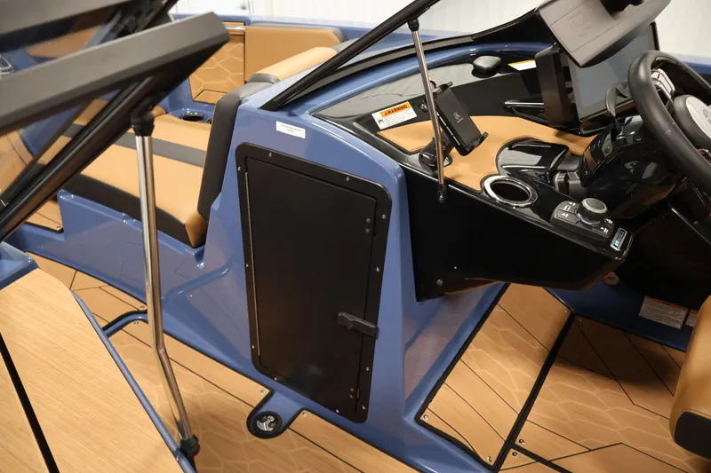 Slide: The Image of 2026 Yamaha Boats 222XD interior with modern dashboard and seating. - 18