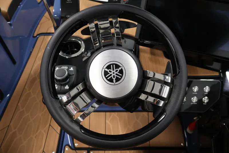 Slide: The Image of Steering wheel of 2026 Yamaha Boats 222XD, featuring sleek design and modern controls. - 22