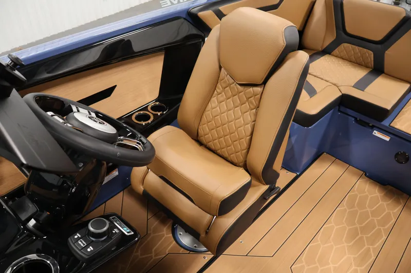 Slide: The Image of 2026 Yamaha Boats 222XD interior with tan leather seats and modern steering console. - 30