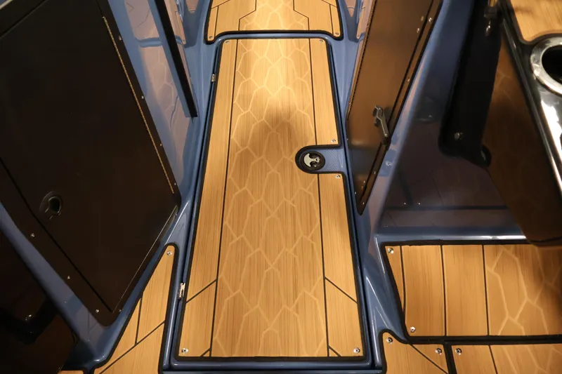 Slide: The Image of 2026 Yamaha Boats 222XD interior with sleek wood-patterned flooring and modern design. - 32