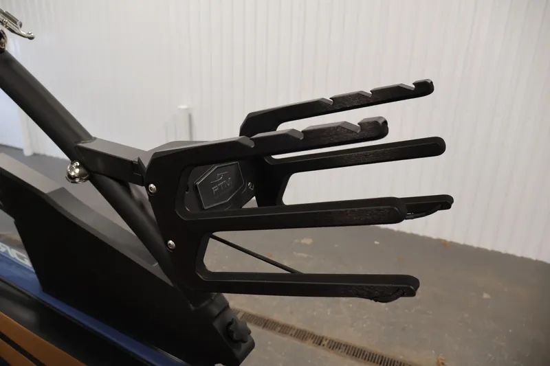 Slide: The Image of Wakeboard rack on 2026 Yamaha Boats 222XD, featuring sleek black design. - 38