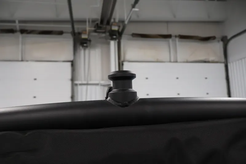 Slide: The Image of 2026 Yamaha Boats 222XD interior detail in a garage setting. - 39