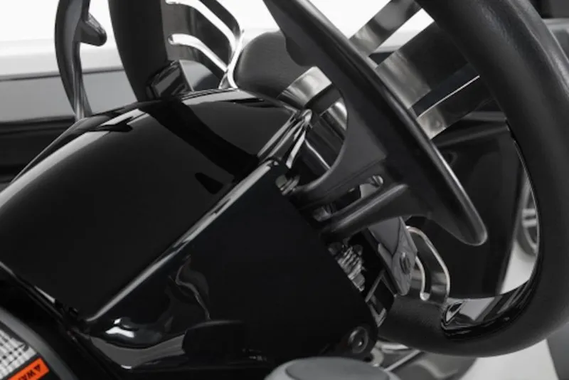 Slide: The Image of Close-up of 2026 Yamaha Boats 222XD steering wheel and controls. - 4