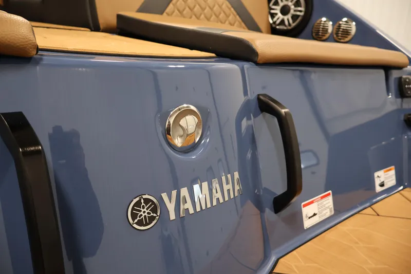 Slide: The Image of 2026 Yamaha Boats 222XD, blue exterior with logo and seating details. - 42