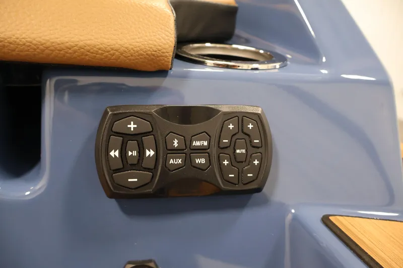 Slide: The Image of Control panel of 2026 Yamaha Boats 222XD, featuring audio and Bluetooth functions. - 43