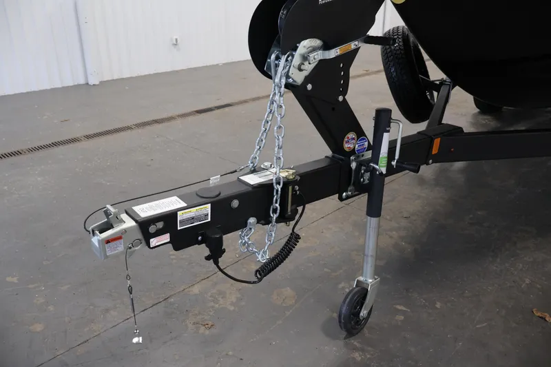 Slide: The Image of Trailer hitch of 2026 Yamaha Boats 222XD with safety chains and wheel jack. - 44
