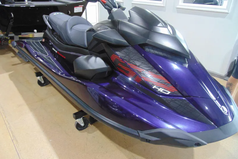 The Image of 2026 Yamaha WaveRunner GP HO in showroom, sleek purple design, high-performance watercraft. - 1