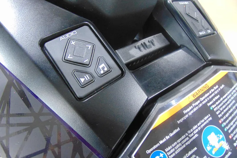 Slide: The Image of 2026 Yamaha WaveRunner GP HO audio controls and warning label close-up. - 10