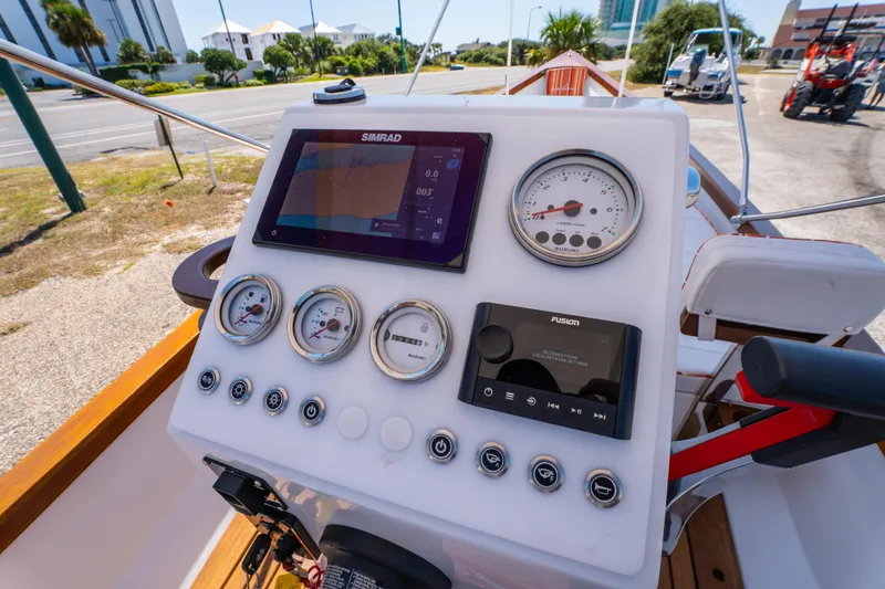 Slide: The Image of Control panel of 2025 Caribiana Maracas 23 Skiff with gauges and navigation display. - 18