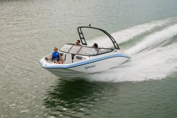 The Image of 2026 Yamaha AR190 boat speeding on water with passengers enjoying the ride. - 1