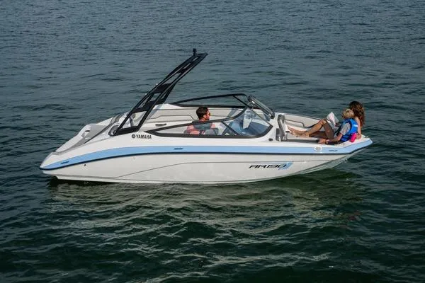 Slide: The Image of 2026 Yamaha AR190 boat cruising on open water with passengers enjoying the ride. - 3