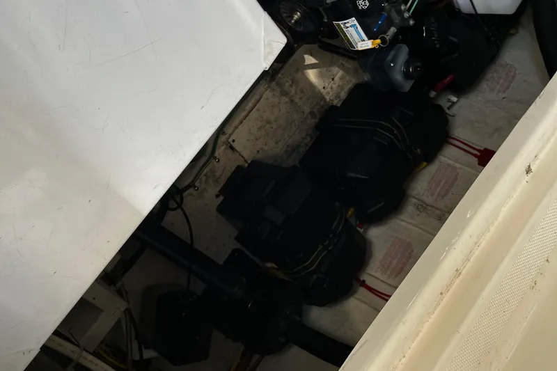 Slide: The Image of Engine compartment of a 2008 Bayliner 320 boat, showing mechanical components. - 17