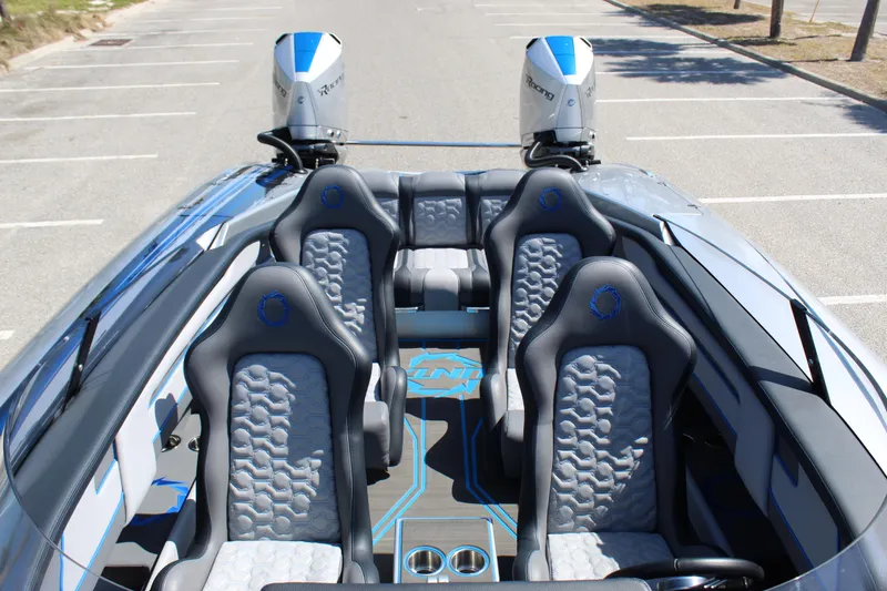 Slide: The Image of 2025 Fountain 34 Thundercat boat interior with sleek seating and dual engines. - 14