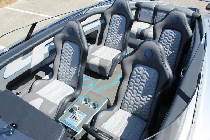 Slide: The Image of 2025 Fountain 34 Thundercat interior with sleek, modern seating and control panel. - 17