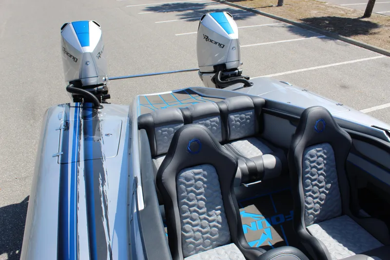 Slide: The Image of 2025 Fountain 34 Thundercat boat interior with dual engines and stylish seating. - 18