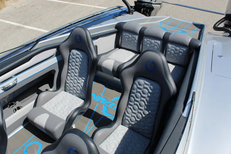 Slide: The Image of Interior of 2025 Fountain 34 Thundercat with stylish gray and blue seating. - 19