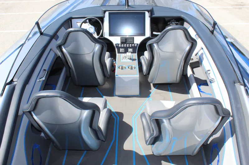 Slide: The Image of Interior of 2025 Fountain 34 Thundercat boat with modern seating and control panel. - 22
