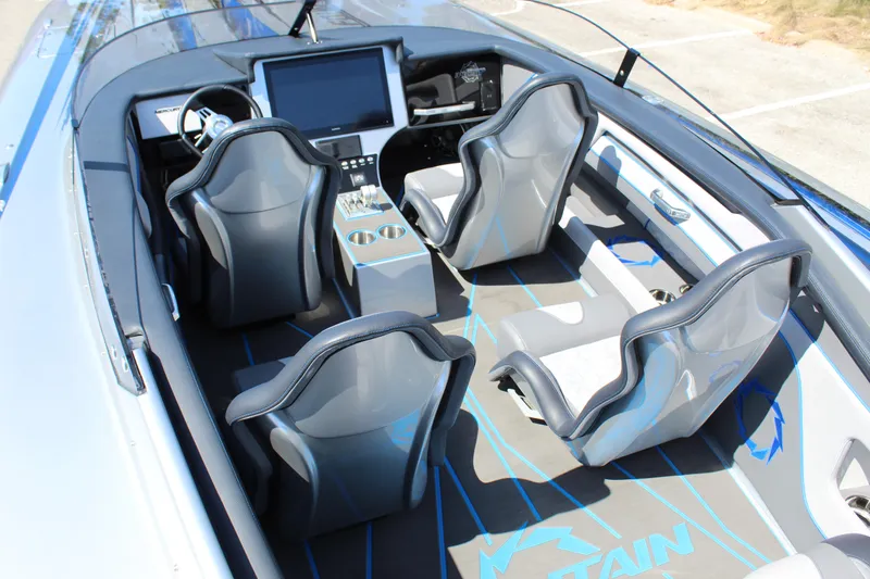 Slide: The Image of 2025 Fountain 34 Thundercat interior with sleek seating and modern dashboard design. - 23