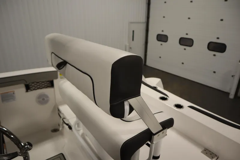 Slide: The Image of 2026 Yamaha Boats 220 FSH Sport interior, featuring sleek white seating and modern design elements. - 37