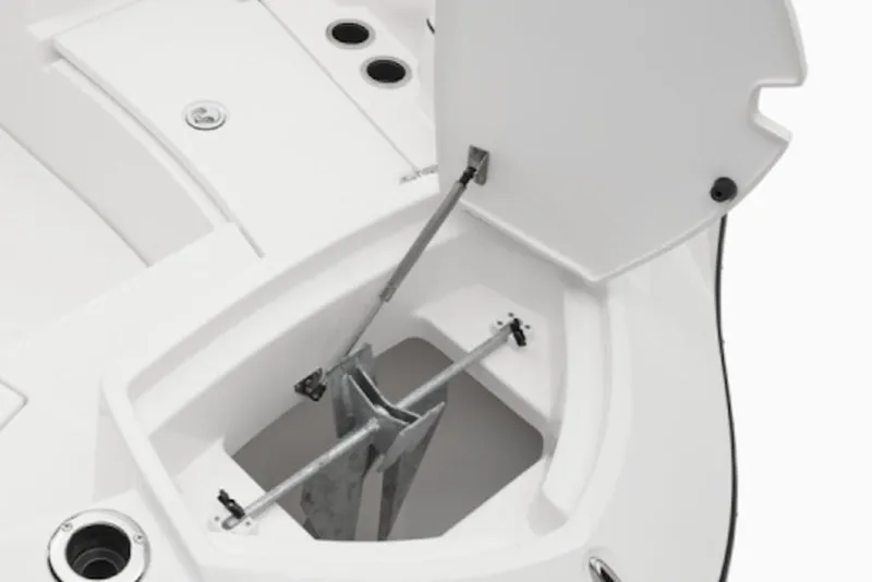 Slide: The Image of 2026 Yamaha Boats 220 FSH Sport anchor compartment with open hatch. - 52