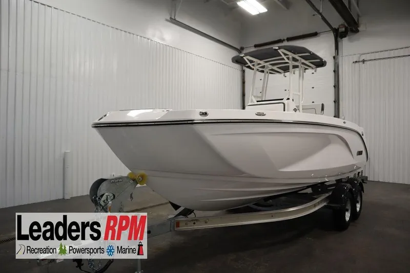 Slide: The Image of 2026 Yamaha Boats 220 FSH Sport in showroom, on trailer, Leaders RPM logo visible. - 57