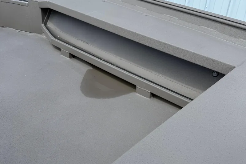 Slide: The Image of 2025 Alweld 1548 Invader boat interior with storage compartment detail. - 10