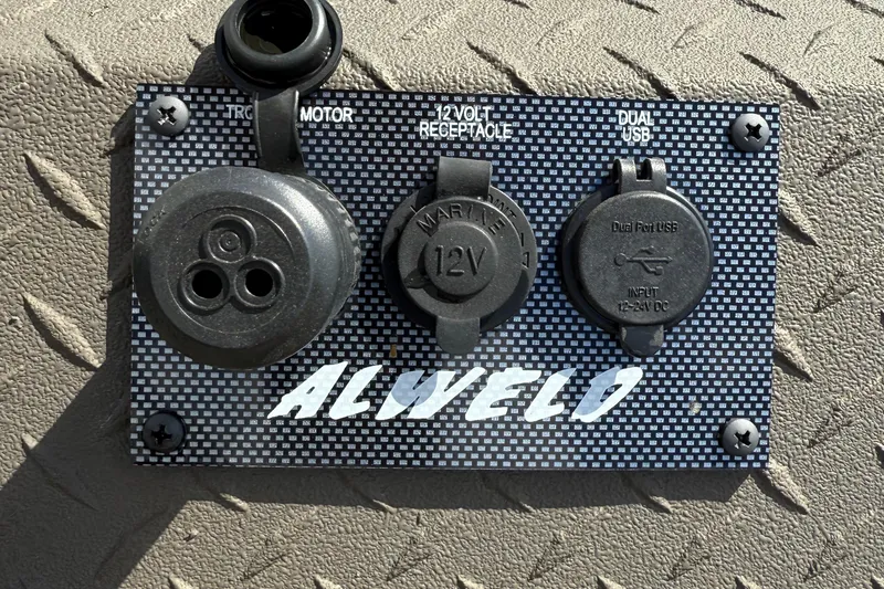 Slide: The Image of 2025 Alweld 1548 Invader control panel with 12V and USB ports. - 12