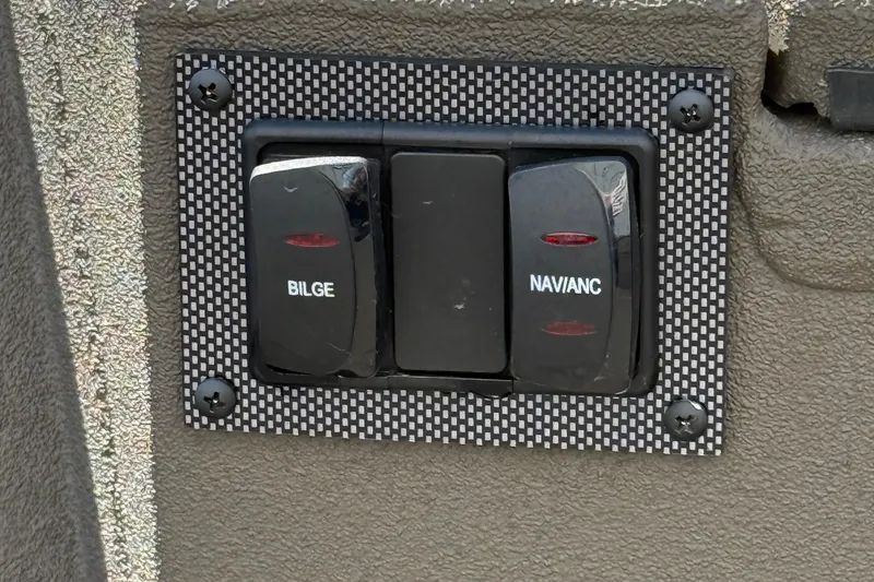 Slide: The Image of Control panel with bilge and navigation switches on 2025 Alweld 1548 Invader boat. - 15