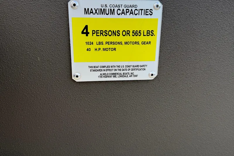 Slide: The Image of 2025 Alweld 1548 Invader capacity plate: 4 persons, 565 lbs, 40 HP motor. - 8