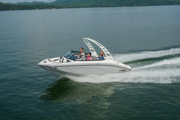 Slide: The Image of 2026 Yamaha Boats 195S cruising on a serene lake with passengers enjoying the ride. - 10