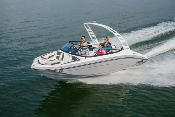 Slide: The Image of 2026 Yamaha Boats 195S cruising on water with passengers enjoying the ride. - 9