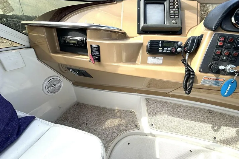 Slide: The Image of Interior helm of 2003 Carver 396 Motor Yacht with navigation equipment and controls. - 24