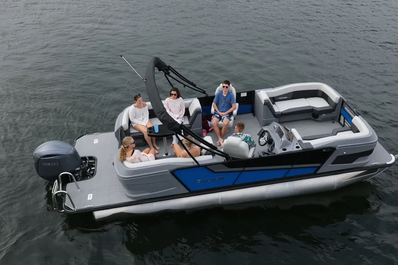 The Image of Sylvan R22 LZ DH 2026 pontoon boat with passengers on water. - 0