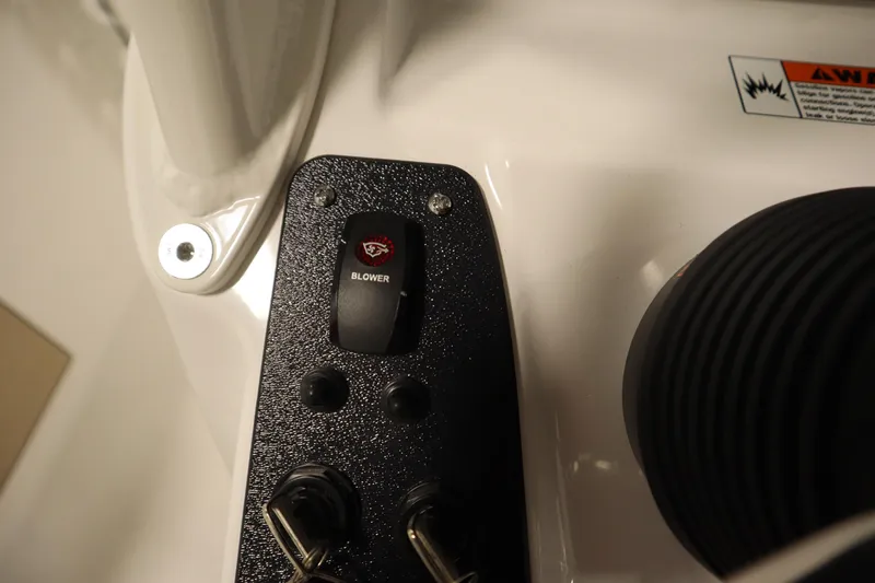 Slide: The Image of Control panel of 2026 Yamaha Boats 222 FSH Sport with blower switch. - 33