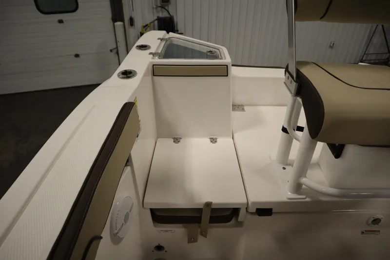 Slide: The Image of 2026 Yamaha Boats 222 FSH Sport interior with seating and storage features. - 40