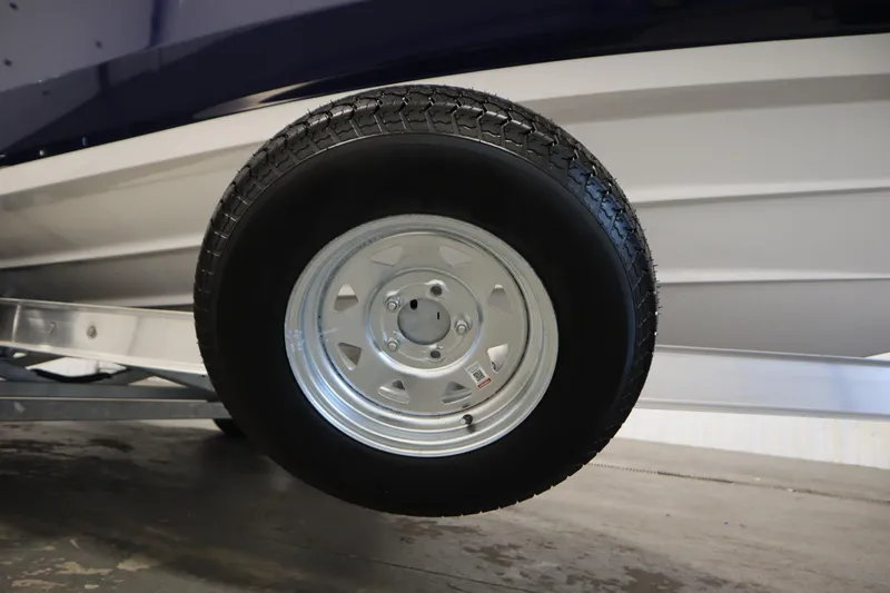 Slide: The Image of Trailer wheel of 2026 Yamaha Boats 222 FSH Sport, showcasing tire and rim design. - 48