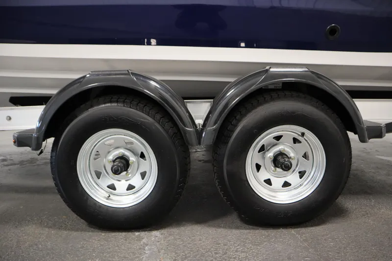 Slide: The Image of Trailer wheels of a 2026 Yamaha Boats 222 FSH Sport. - 50
