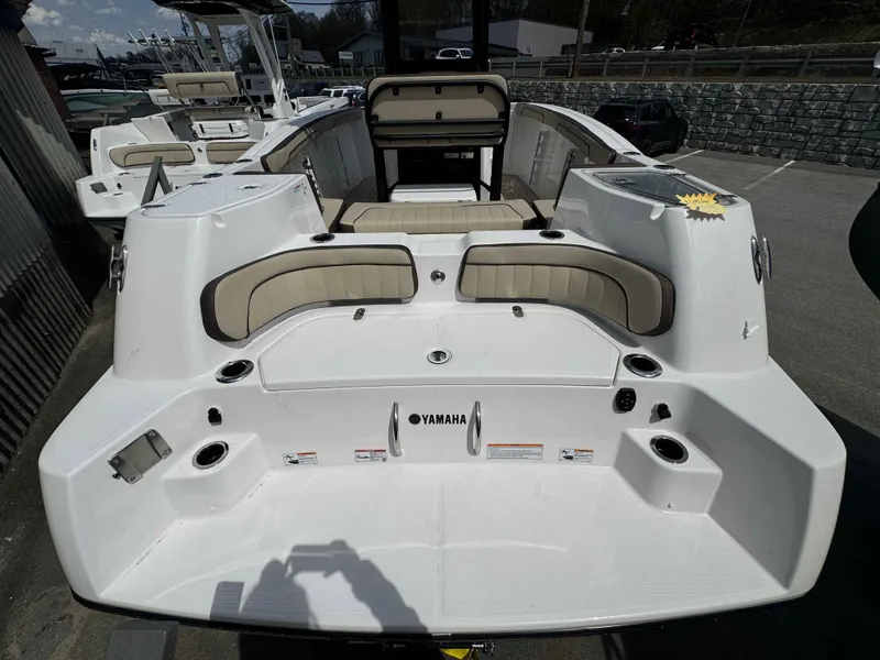 Slide: The Image of Yamaha Boats 2026 255 FSH Sport H with spacious deck and seating area. - 19