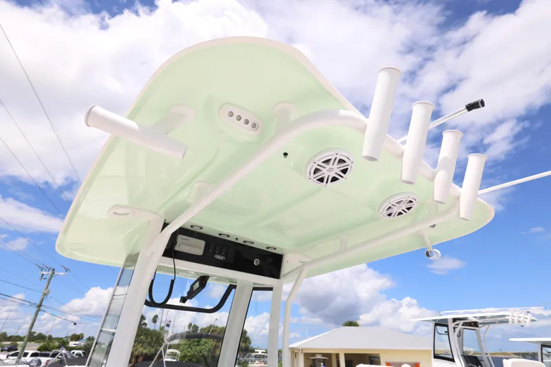 Slide: The Image of 2026 Sea Hunt Ultra 245 SE boat console with Garmin navigation system. - 19