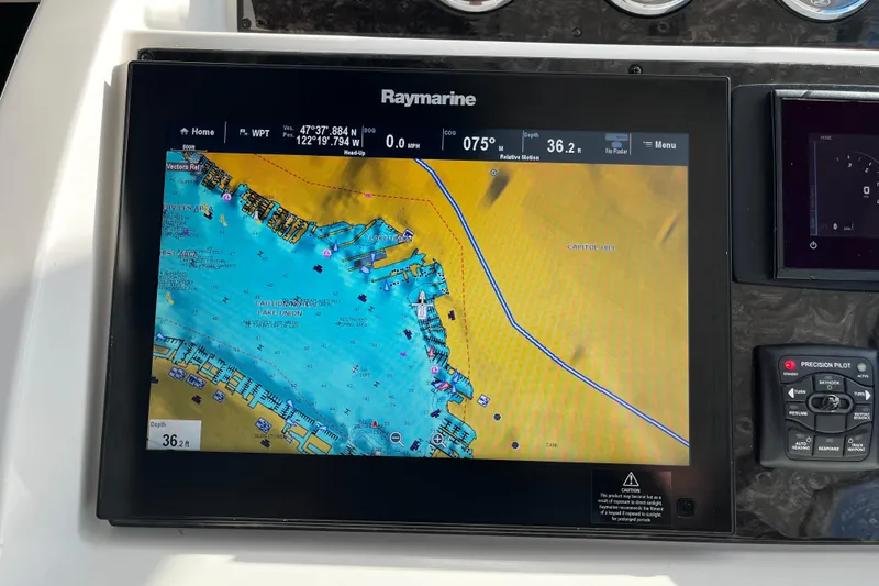 Slide: The Image of Raymarine navigation display on 2010 Sea Ray 450 Sundancer, showing detailed marine chart. - 11