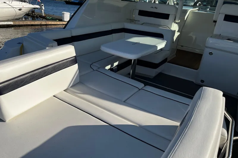 Slide: The Image of Luxurious seating area on a 2010 Sea Ray 450 Sundancer yacht. - 6