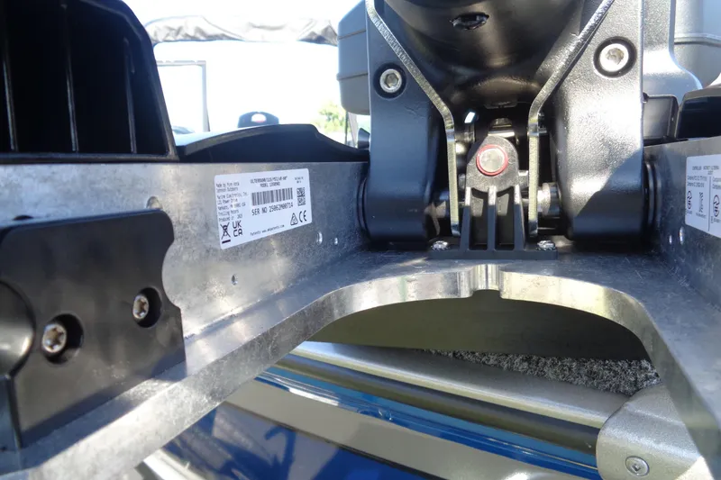 Slide: The Image of Close-up of 2026 Lund 1875 Impact XS Sport boat motor mount details. - 6