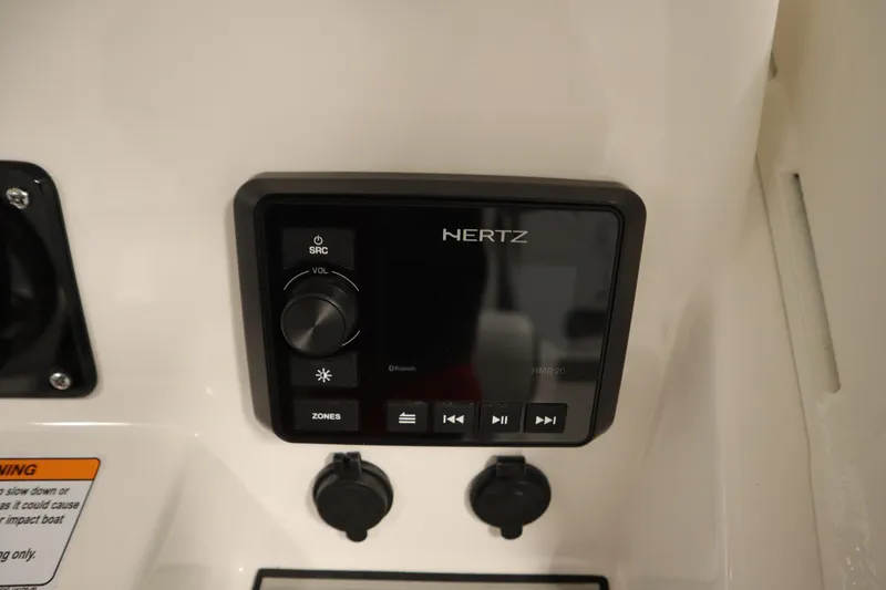 Slide: The Image of Yamaha Boats 2026 222 FSH Sport E audio control panel with Hertz display. - 34