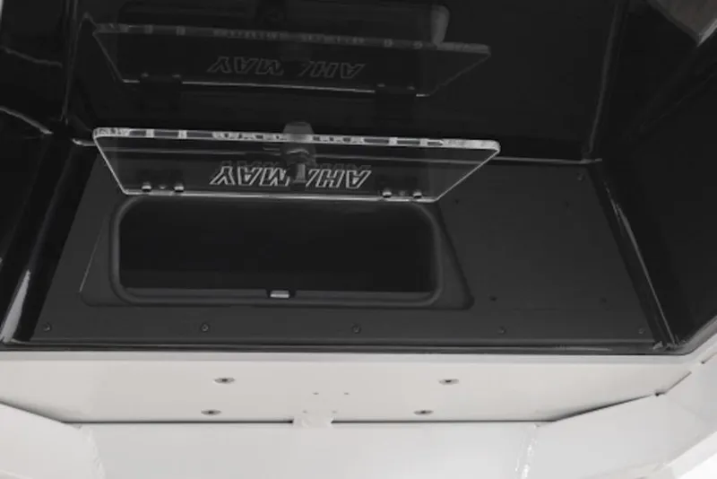 Slide: The Image of Storage compartment of 2026 Yamaha Boats 222 FSH Sport E, featuring sleek design. - 57