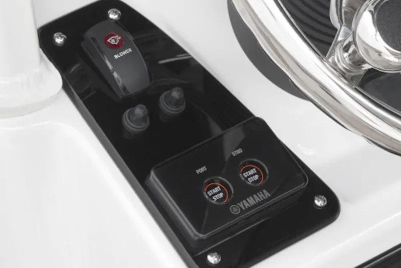Slide: The Image of Control panel of 2026 Yamaha Boats 222 FSH Sport E, featuring start/stop buttons and blower switch. - 60