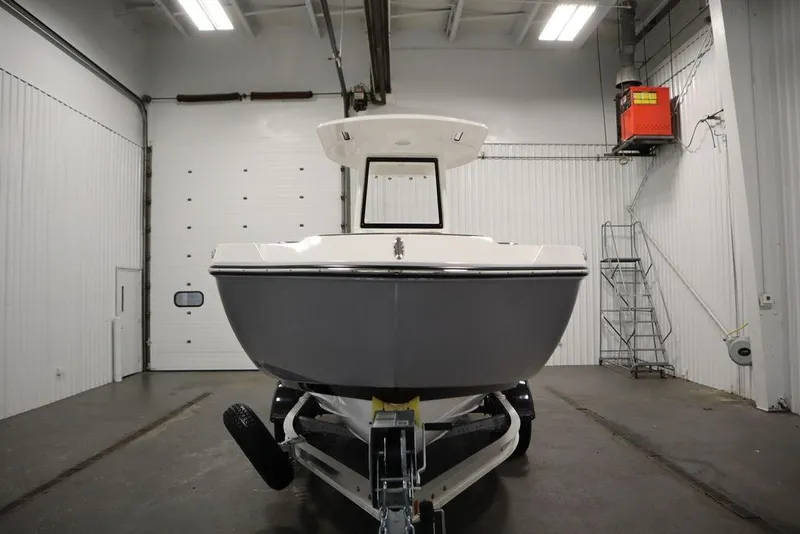 Slide: The Image of 2026 Yamaha Boats 222 FSH Sport E in a spacious indoor garage. - 61